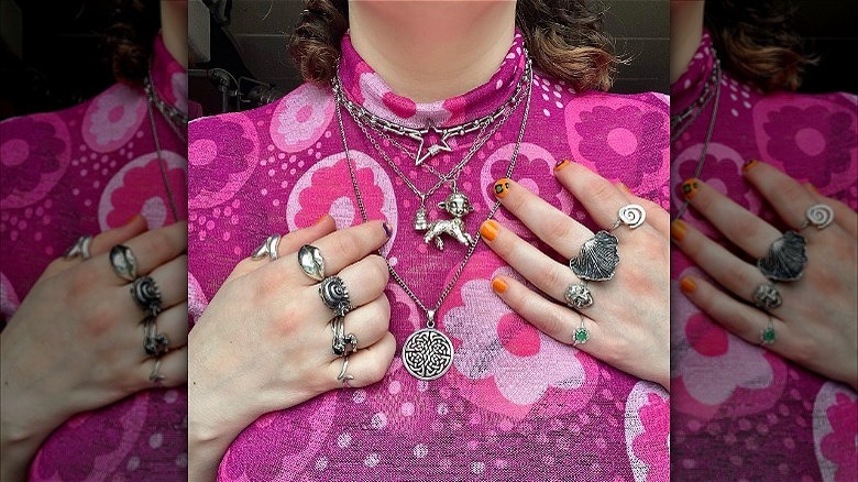 woman wearing chunky silver rings