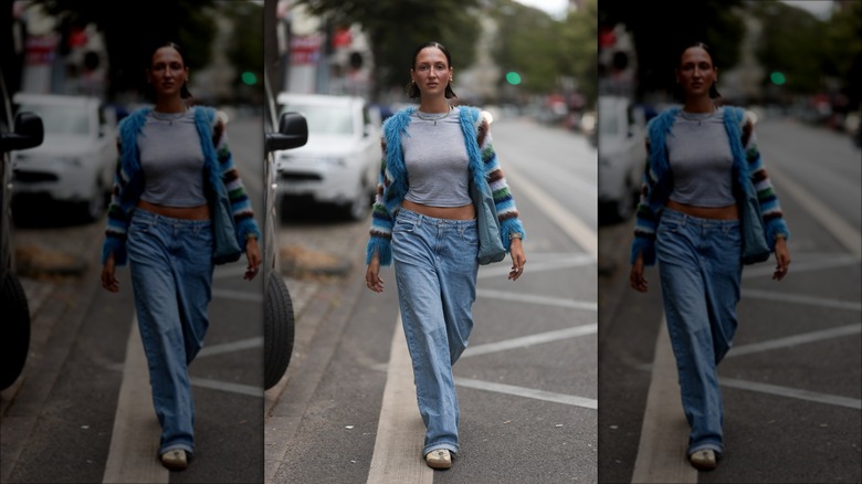 woman wearing colorful fuzzy cardigan