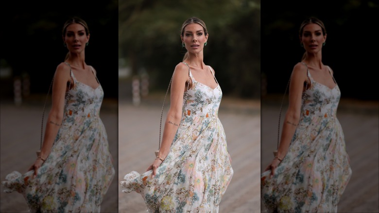 woman wearing flowy floral dress