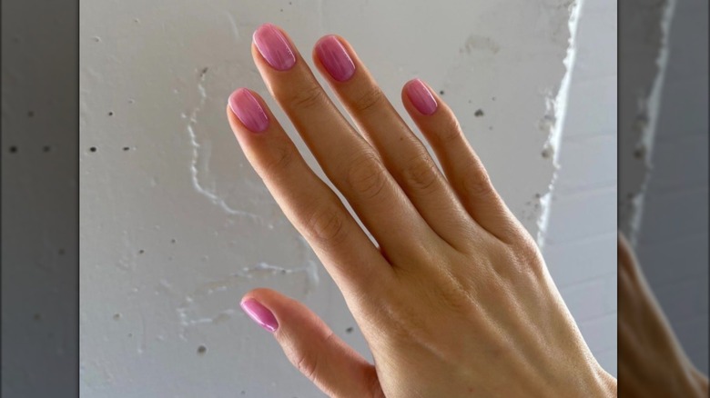 Bright pink rose water nails