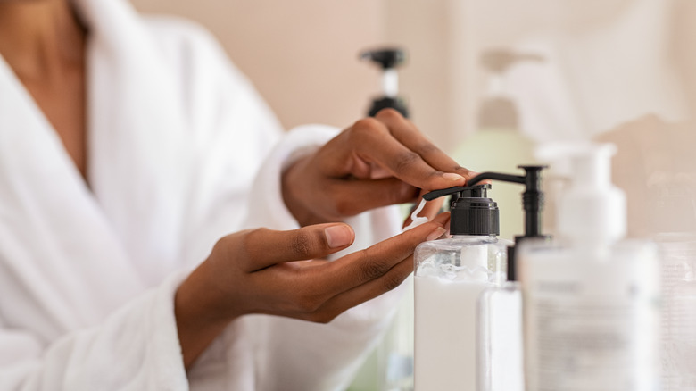 woman applying lotion