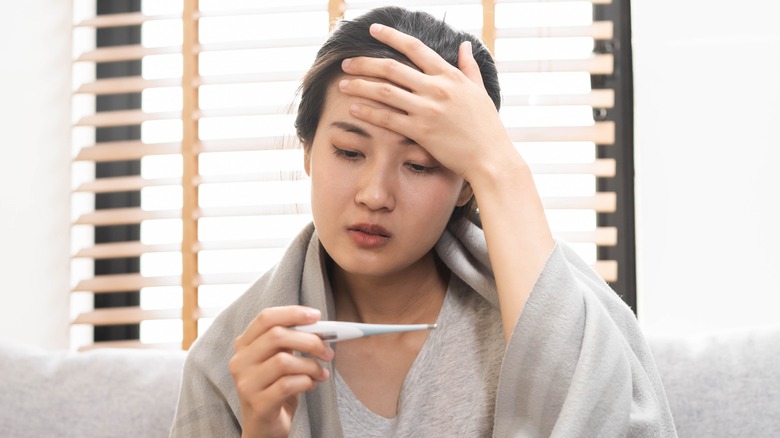 young woman feeling sick