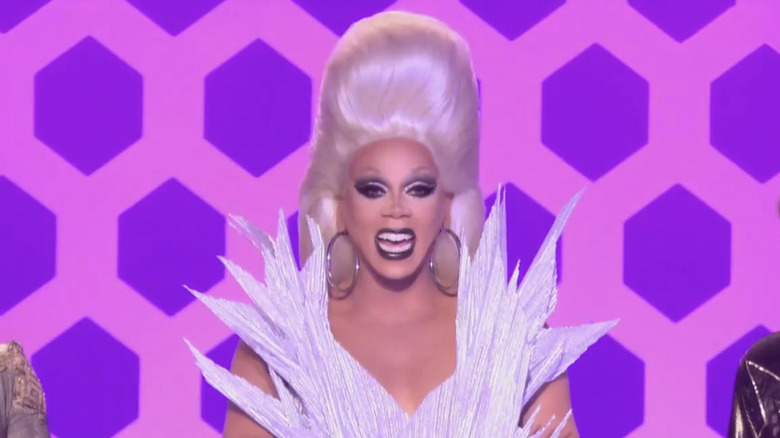 RuPaul in a white spiky dress