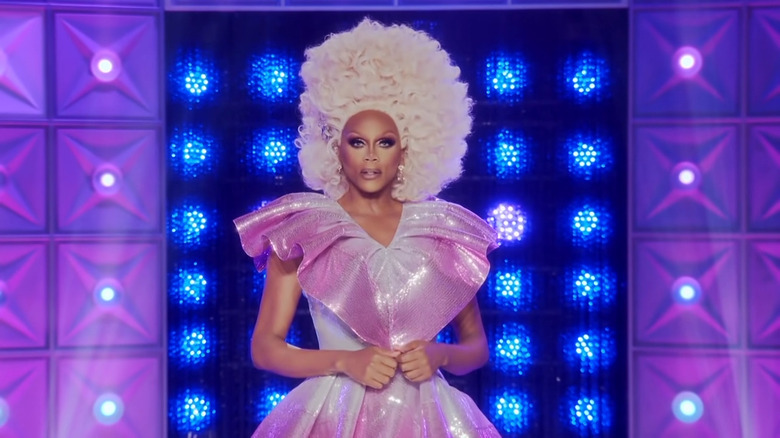 RuPaul in a pink dress