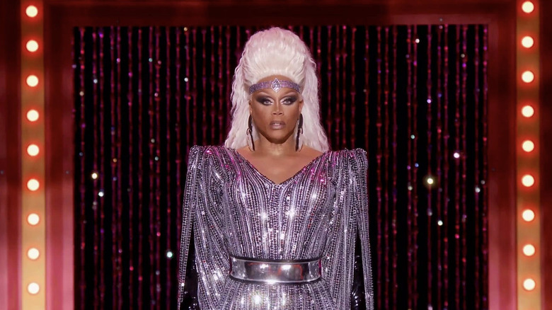 RuPaul in a silver dress