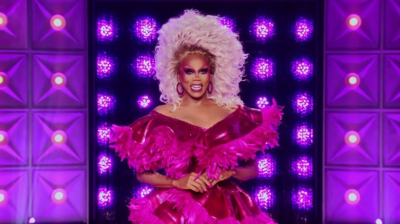 RuPaul in a hot pink dress