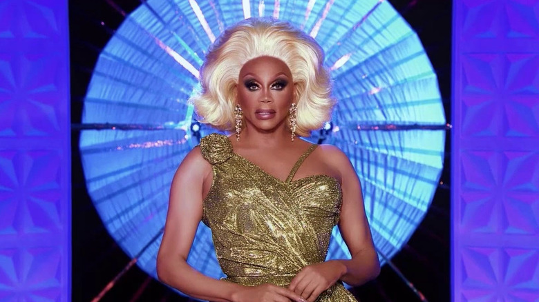 RuPaul in a golden dress