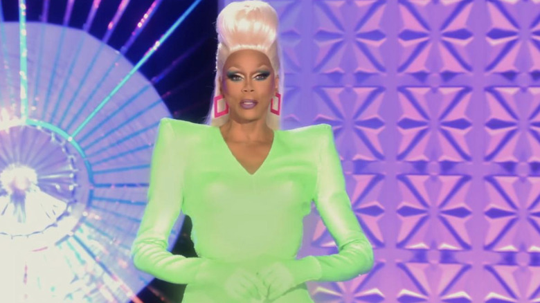 RuPaul in a neon green dress