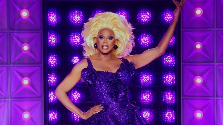 RuPaul in a purple dress