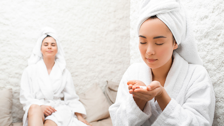 Two women breathing in salt cave