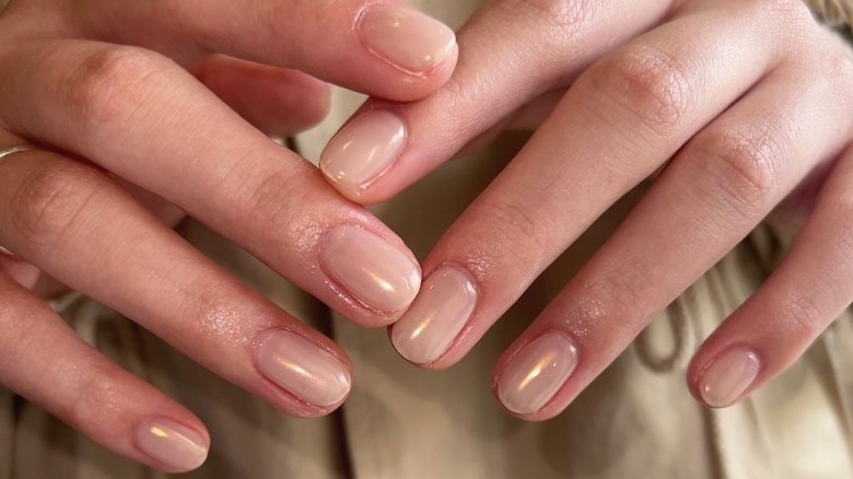 close up of sheer satin nails