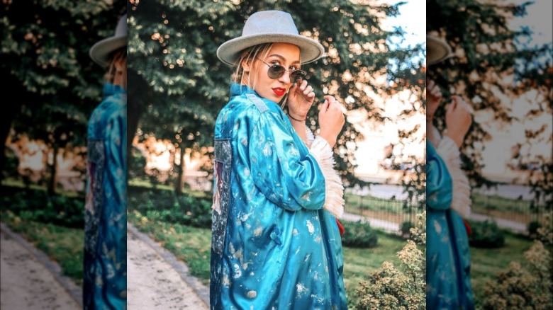 A woman wearing a satin kimono