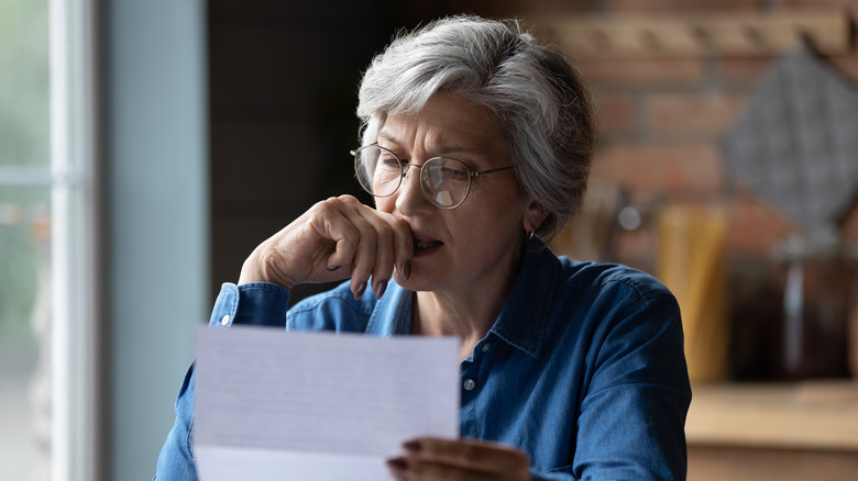 Woman reading letter