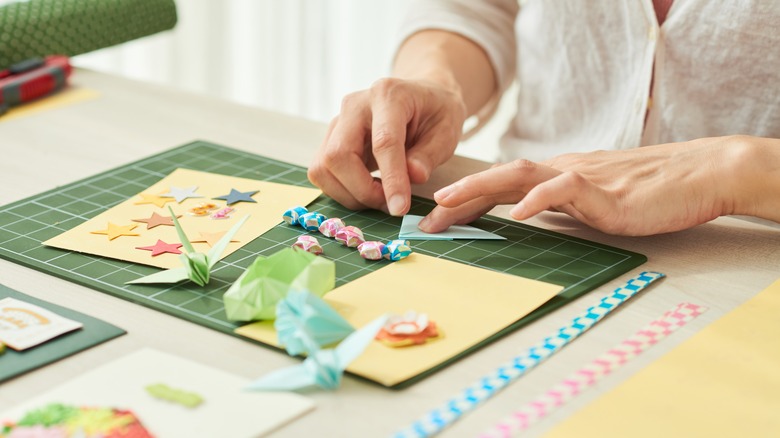 Woman working on a scrapbook