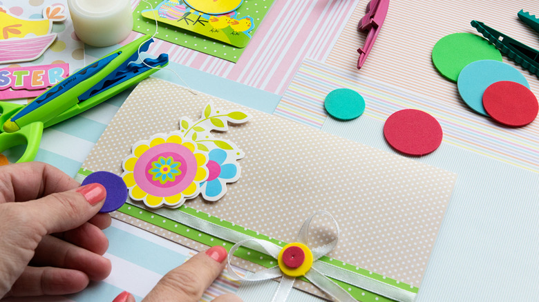 Woman making a scrapbook