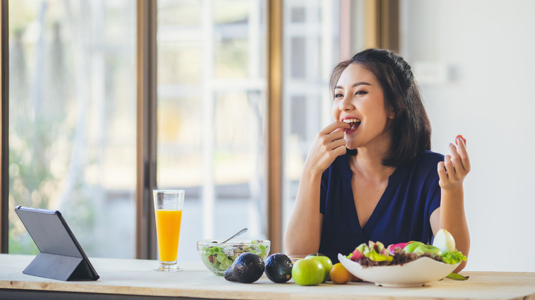 Woman eating healthy foods