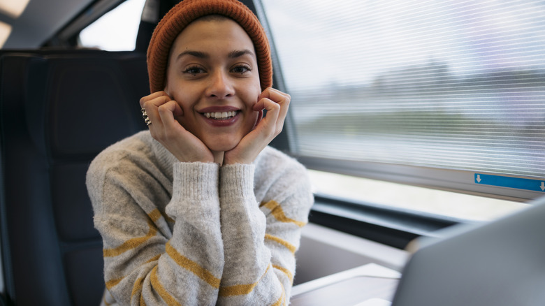 Woman wearing gray sweater