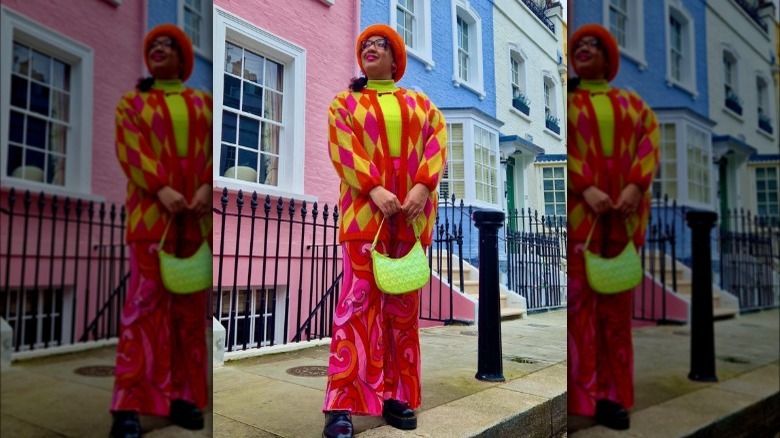 A woman wearing a colorful outfit