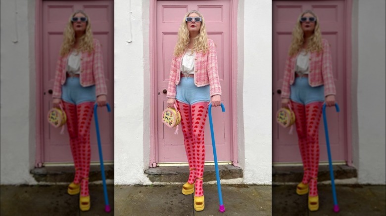 A woman wearing a colorful outfit