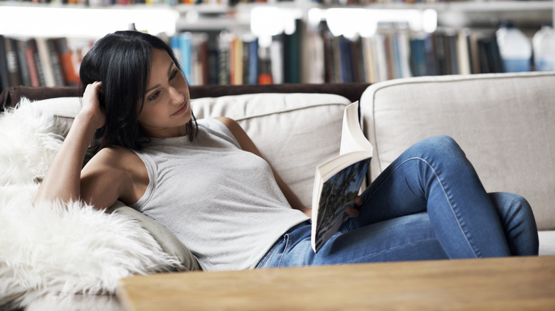 Woman relaxing and reading