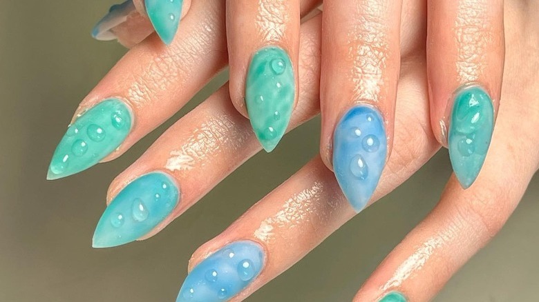 aquatic colored nails with bubbles
