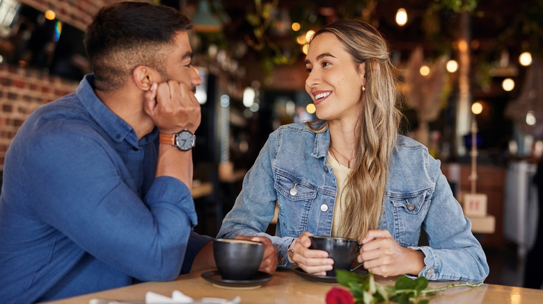 Couple talking at coffee shop