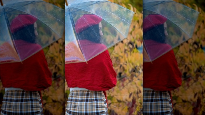 Woman with clear umbrella