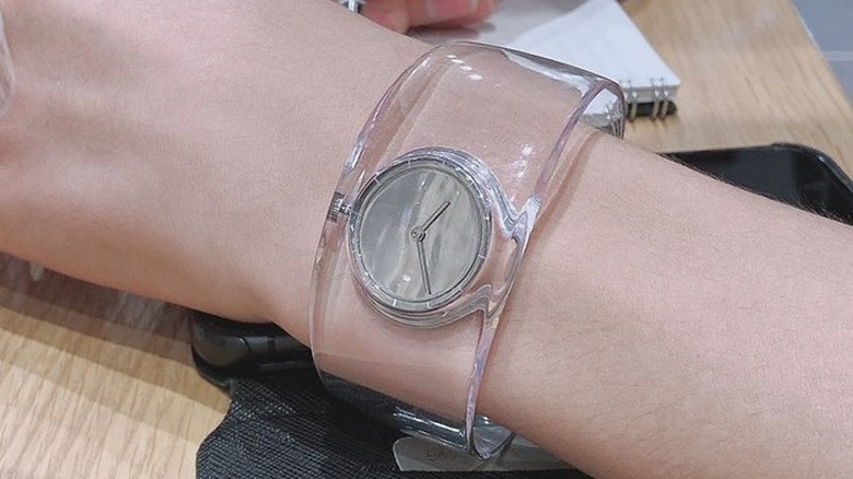 Person wearing clear watch