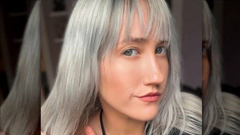 woman with gray hair and bangs