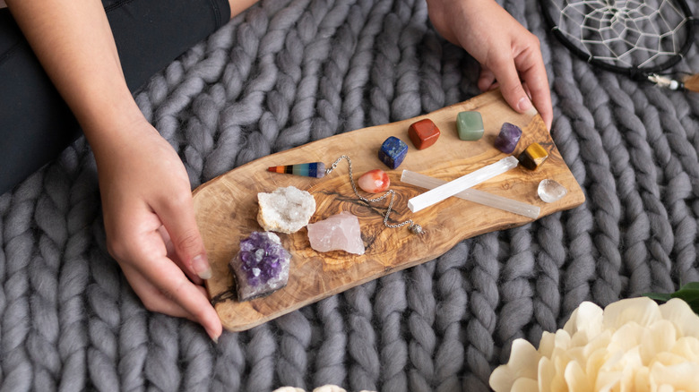 selenite and other stones on altar