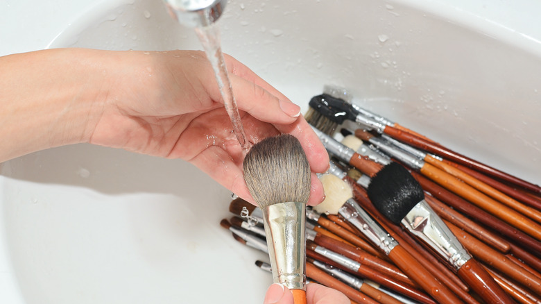 Hand washing makeup brushes