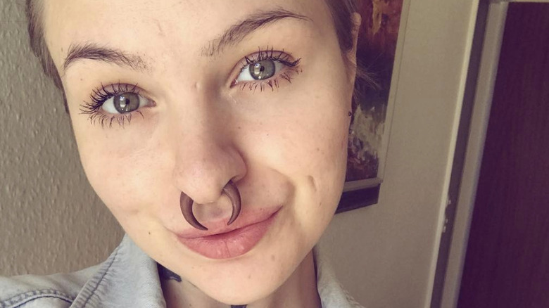 Woman modeling a septum pincher