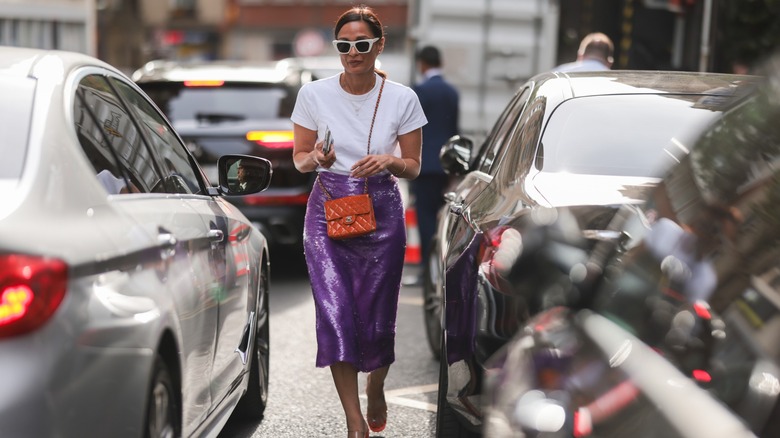 woman wearing purple sequined skirt