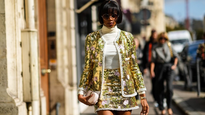 woman wearing patterned sequined skirt