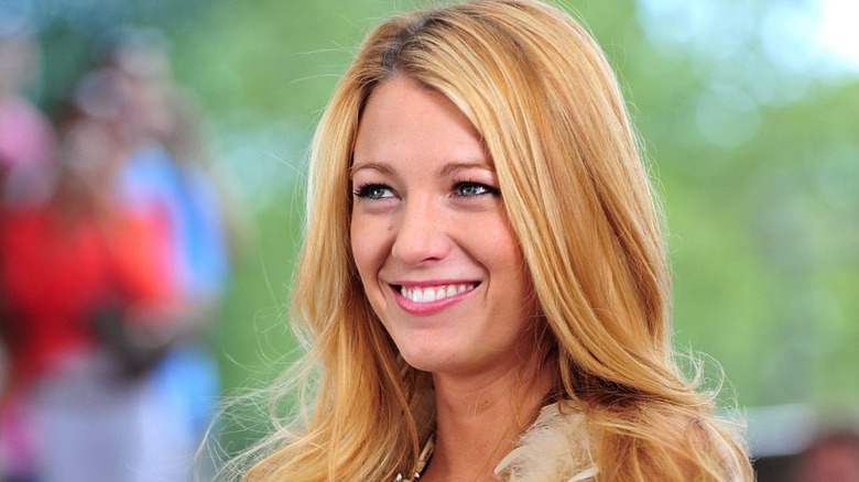 Smiling Blake Lively in "Gossip Girl"