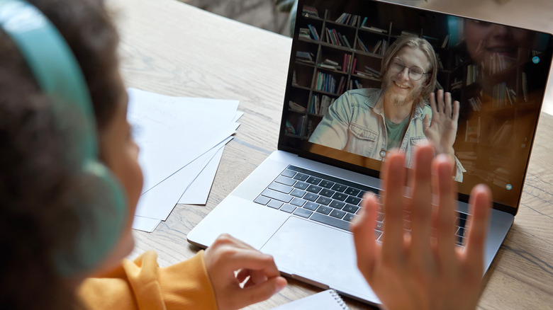 Woman talking with online coach