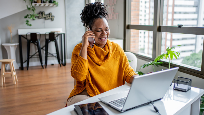 Woman on the phone at desk