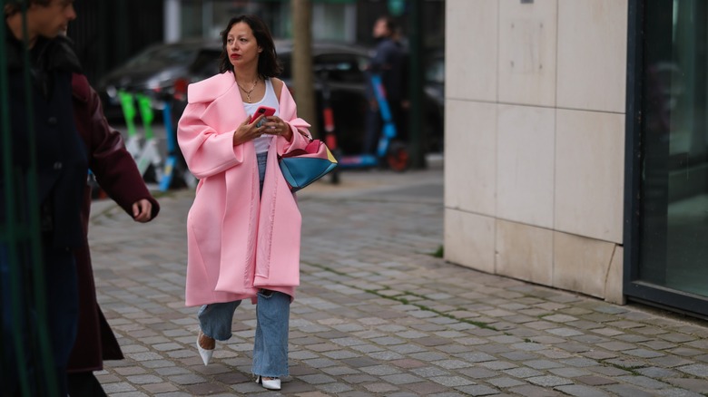 woman wearing pink coat