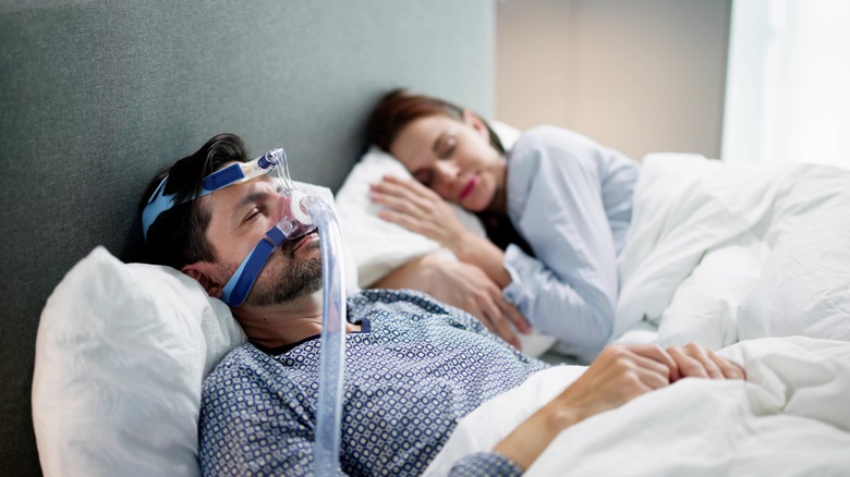 Man using CPAP sleep apnea
