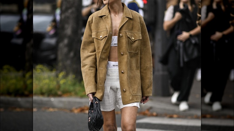 woman wearing bra top and shacket