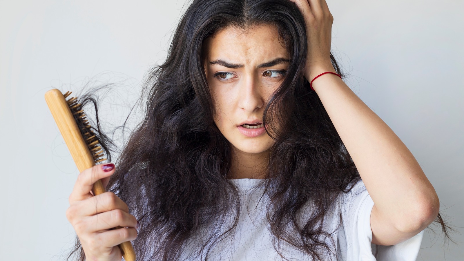 how to tell if hair is shedding or falling out