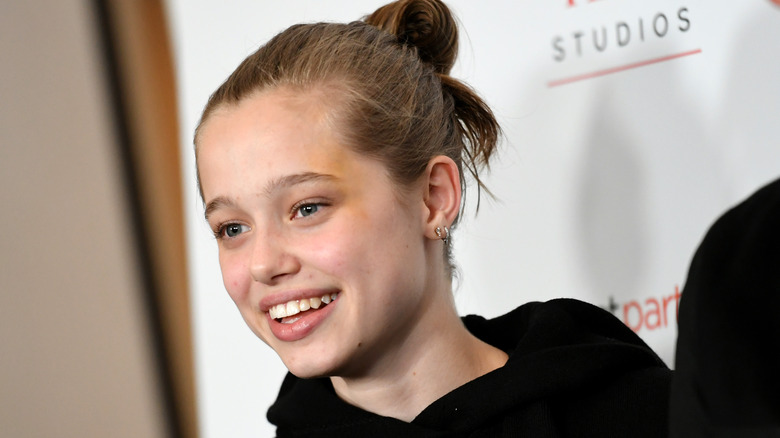 Shiloh Jolie-Pitt with a bun