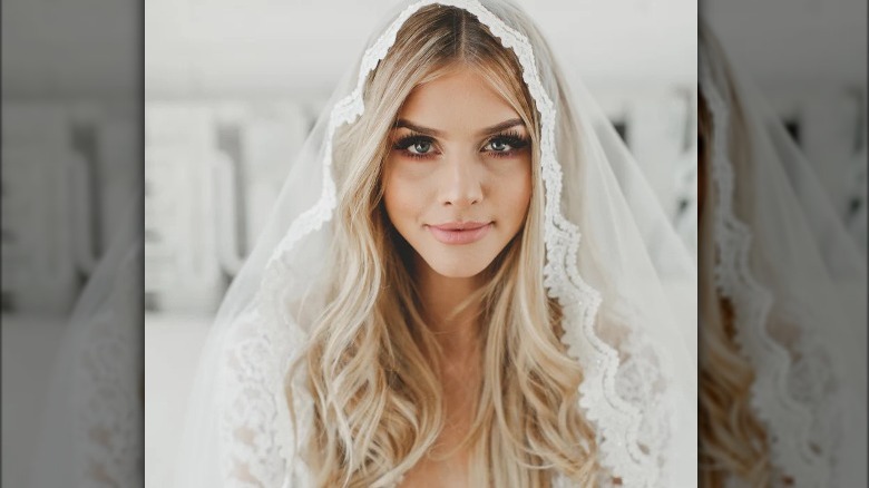 Bride wearing mantilla veil