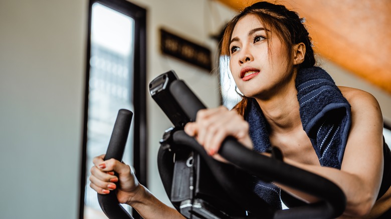 Woman on exercise bike