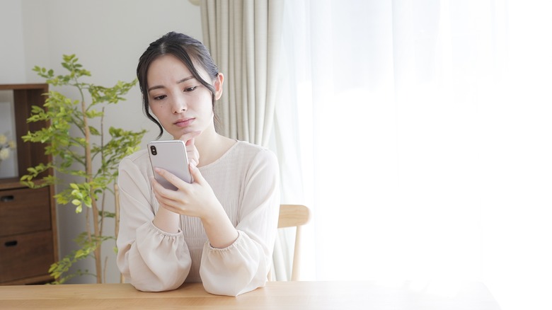 stressed woman with phone