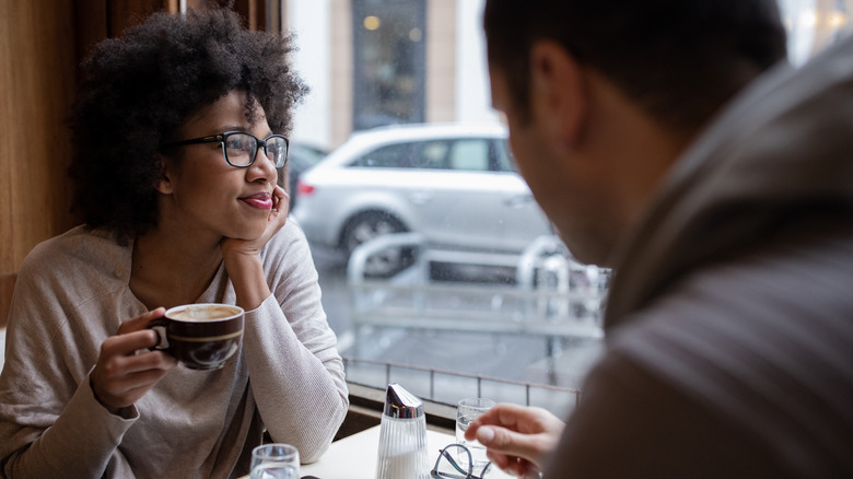 Couple sitting in a cafe