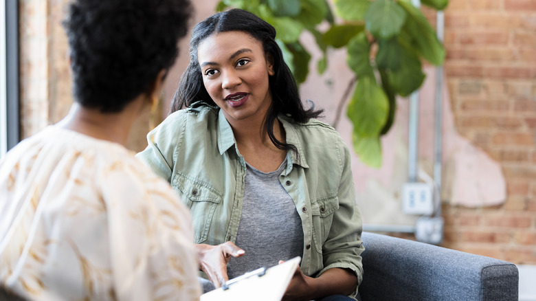 Woman speaking with a matchmaker