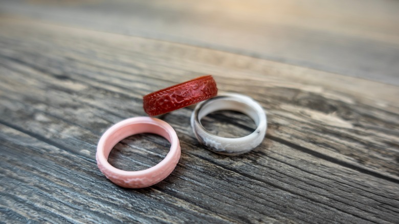 Silicone wedding rings on wood