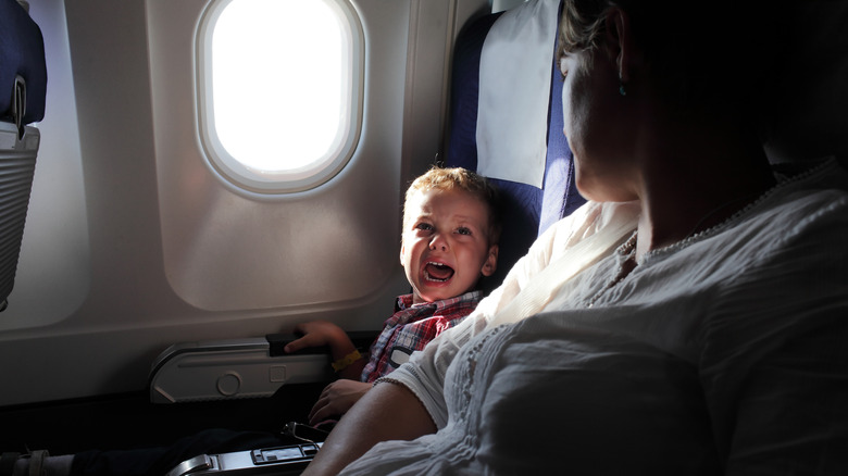 Child crying on plane