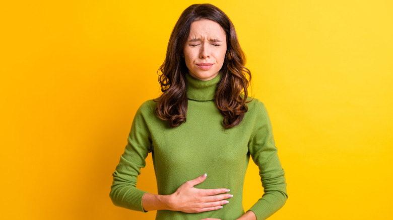 Woman suffering nausea